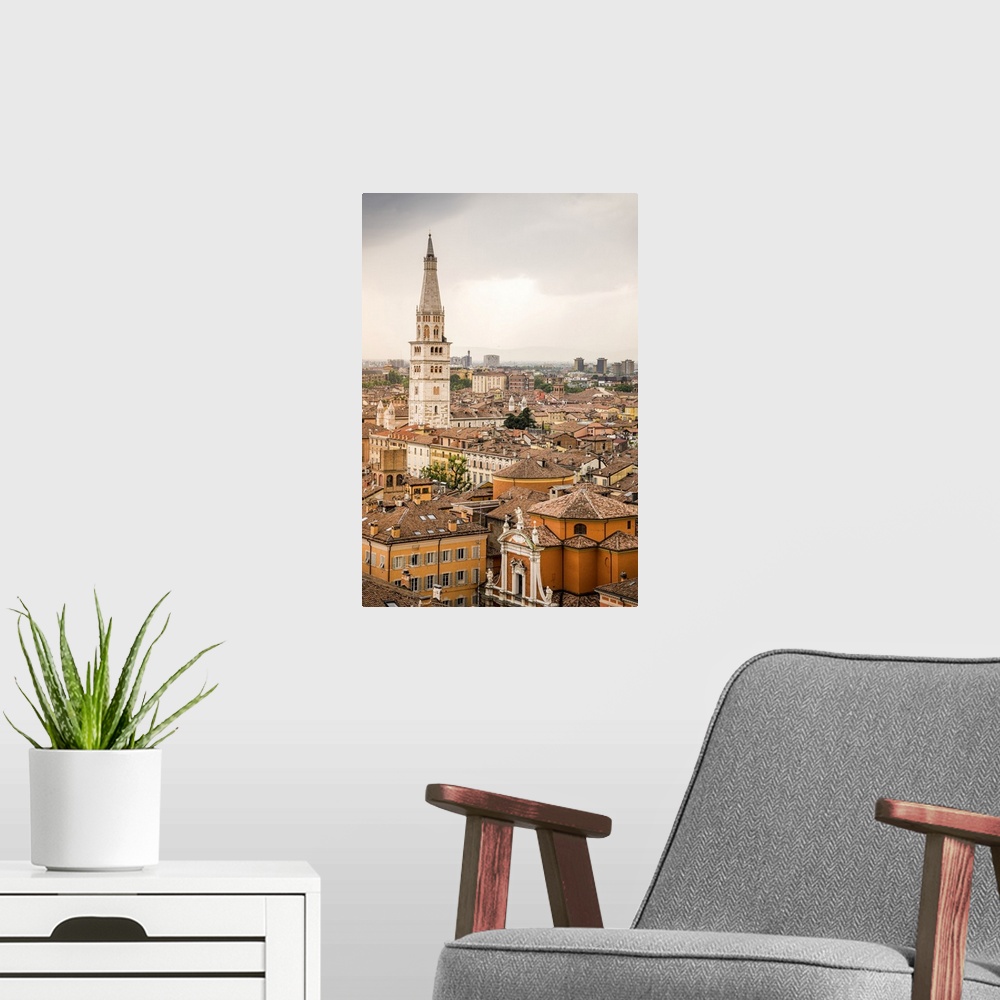 A modern room featuring Ghirlandina tower from top of Military Academy Palace in Piazza Roma. Modena, Emilia Romagna, Italy