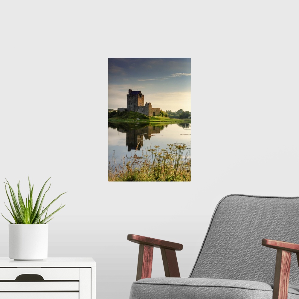 A modern room featuring Europe, Ireland, Dunguaire castle at sunrise in Kinvara village reflecting in the Atlantic Ocean