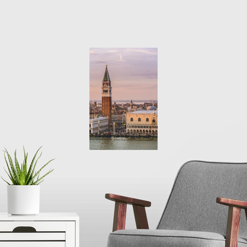 A modern room featuring Italy, Veneto, Venice. High angle view of the city at sunset