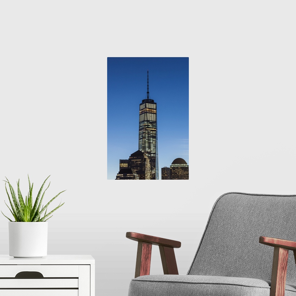 A modern room featuring USA, New York, New York City,  Lower Manhattan skyline with Freedom Tower from Jersey City, dawn