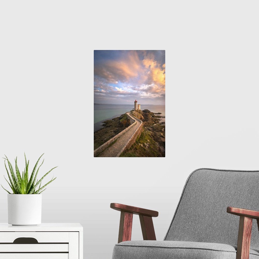 A modern room featuring Petit Minou lighthouse at sunset, PlouzanA village, Brest district, Finistere, Brittany, France.