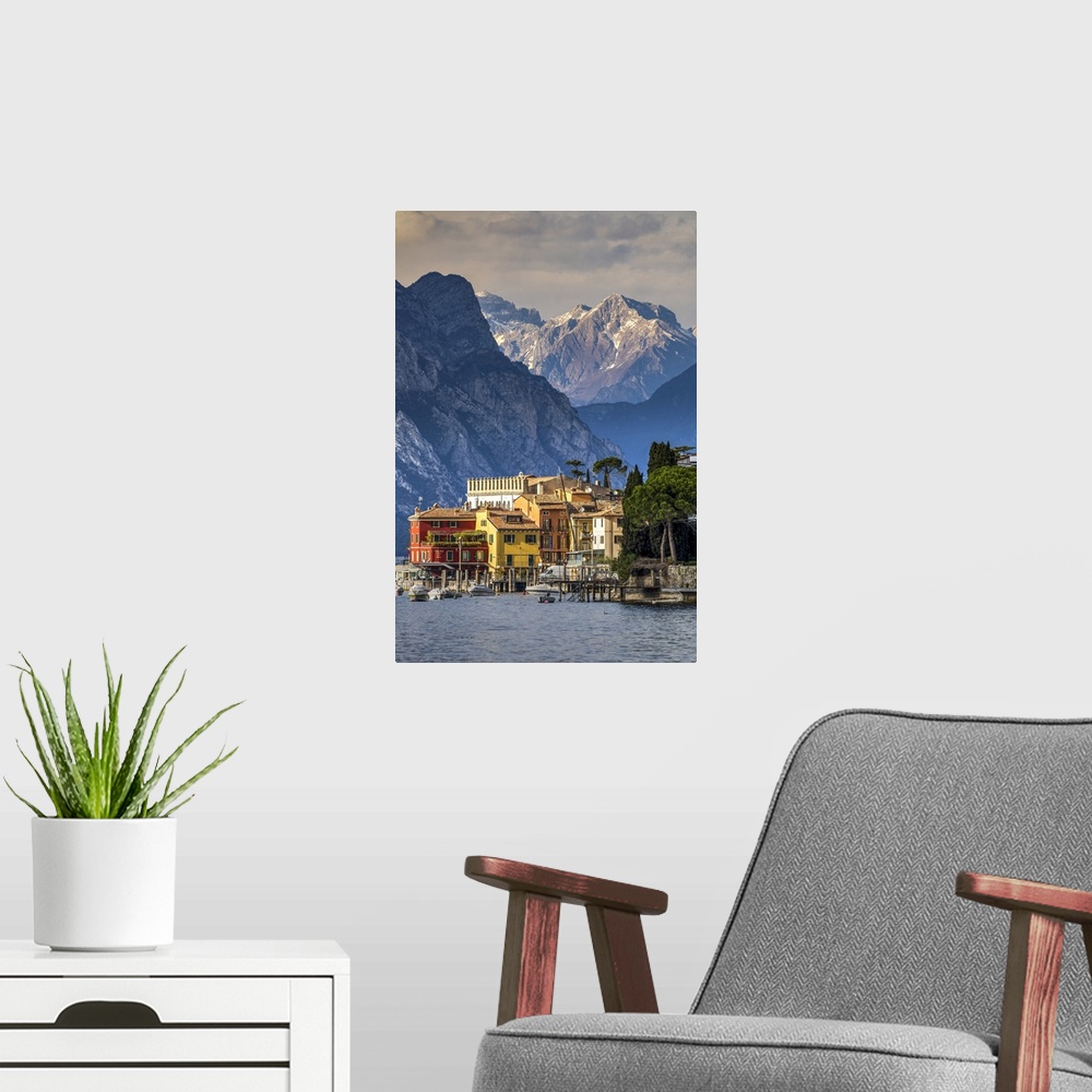 A modern room featuring Scenic view of Malcesine with the Alps in the background, Lake Garda, Veneto, Italy