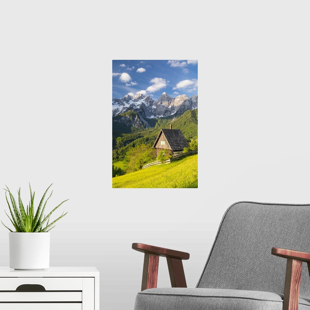 A modern room featuring Slovenia, Gorenjska Region, Kranjska Gora. The Julian Alps and the pyramid like peak of Spik seen...