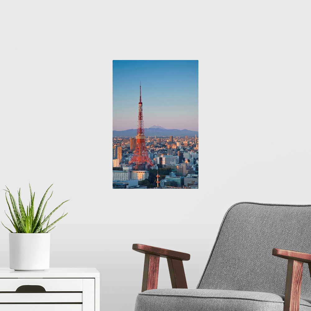 A modern room featuring Tokyo Tower and Mt. Fuji from Shiodome, Tokyo, Japan
