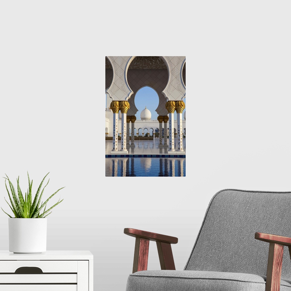 A modern room featuring United Arab Emirates, Abu Dhabi, Sheikh Zayed Grand Mosque, Gilded columns and reflecting pool