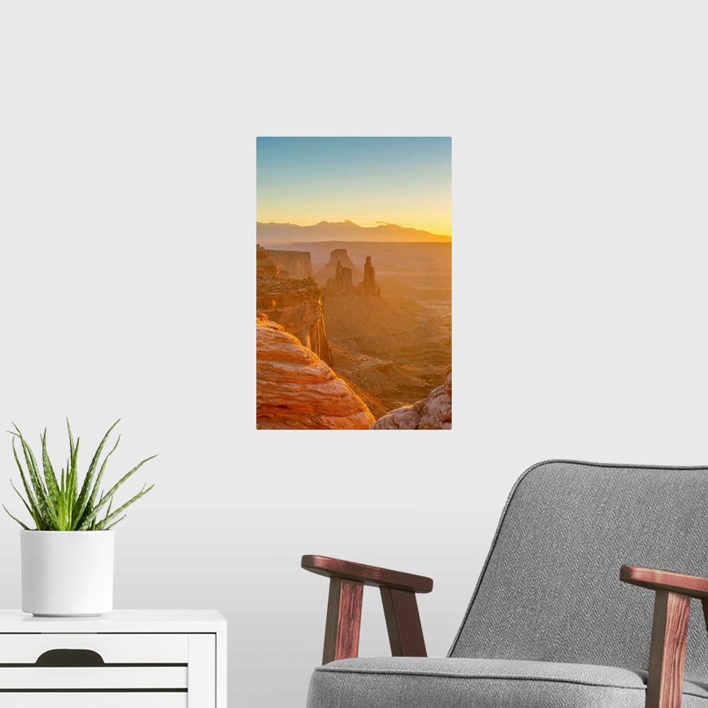 A modern room featuring USA, Utah, Canyonlands National Park, Island in the Sky District, view from Mesa Arch, Sunrise.