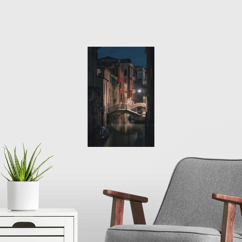 A modern room featuring Venice, Veneto, Italy, Backstreet canals in Castello at night.