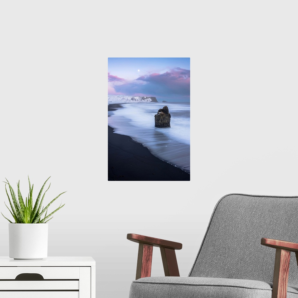 A modern room featuring Vik, Southern Iceland, Europe. The black beach of Reynisfjara on a winter sunset.