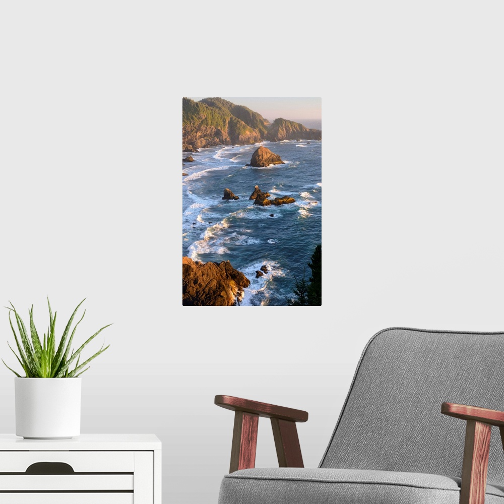 A modern room featuring USA, West Coast, Oregon, State Scenic Corridor, Sunset with waves crashing.