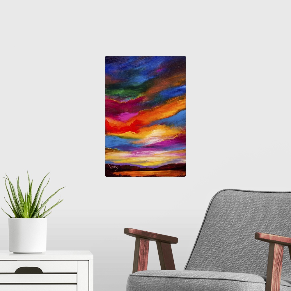 A modern room featuring A contemporary painting of a sunset sky ranging in a gamut of color.