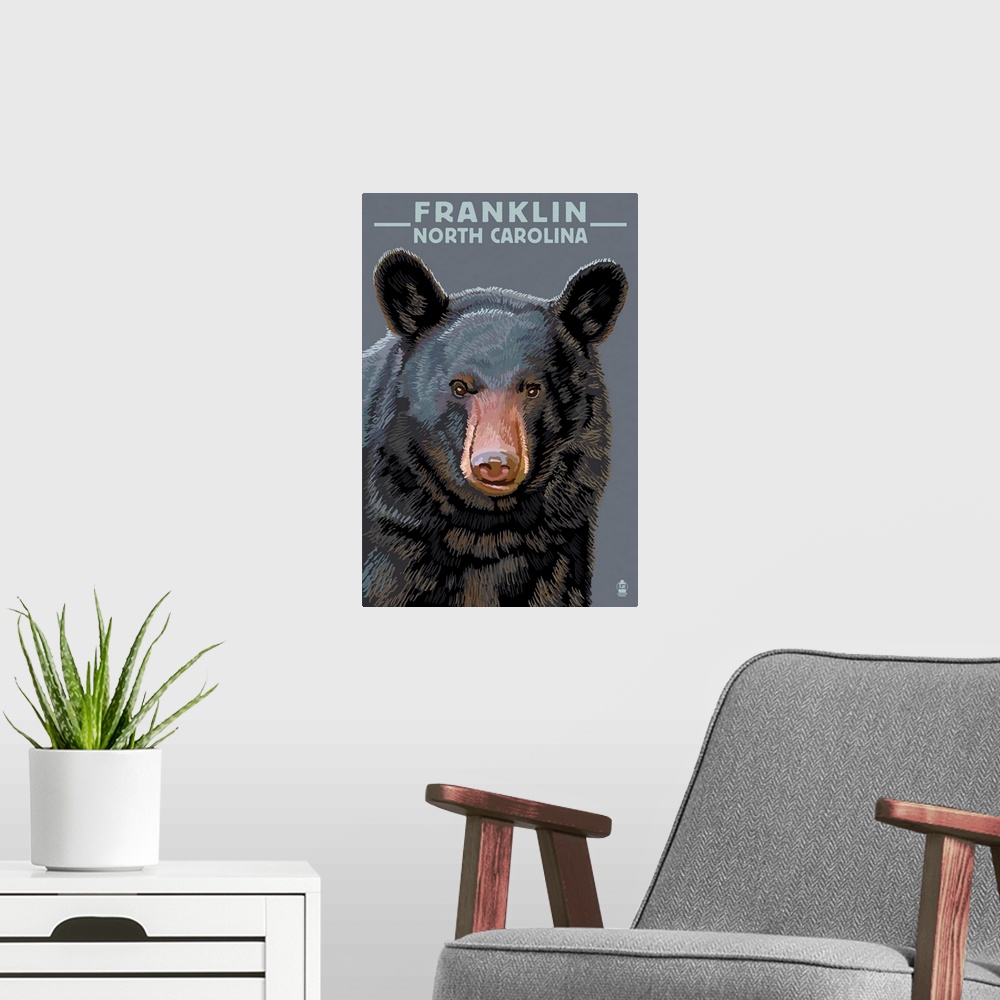 A modern room featuring Retro stylized art poster of an adult black bear's head and shoulders.
