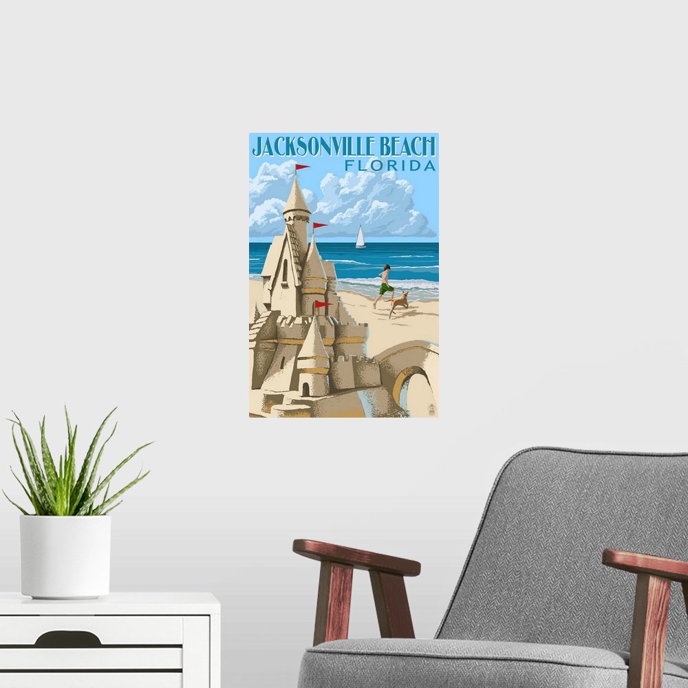 A modern room featuring Retro stylized art poster of sand castle on a beach, with a child and dog playing in the background.