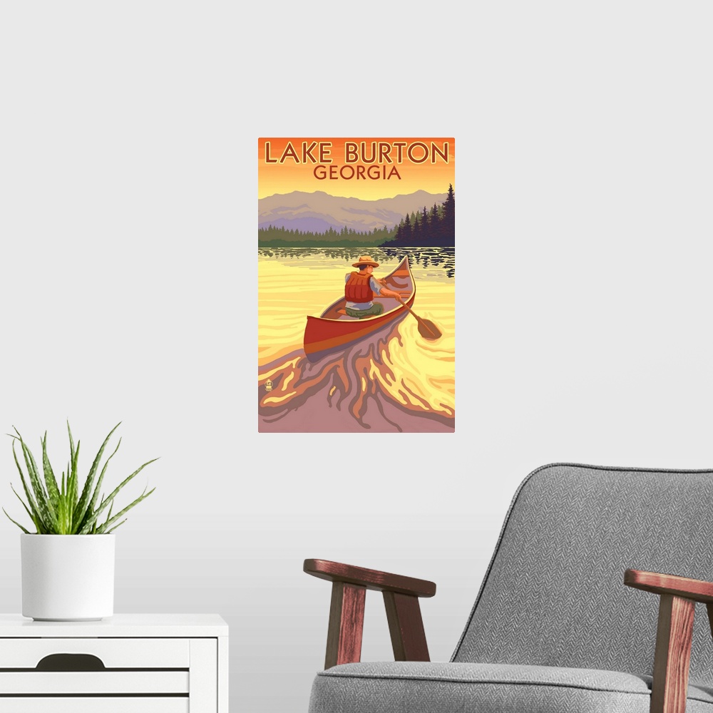 A modern room featuring Retro stylized art poster of a man in a canoe paddling toward a line of trees at sunset.