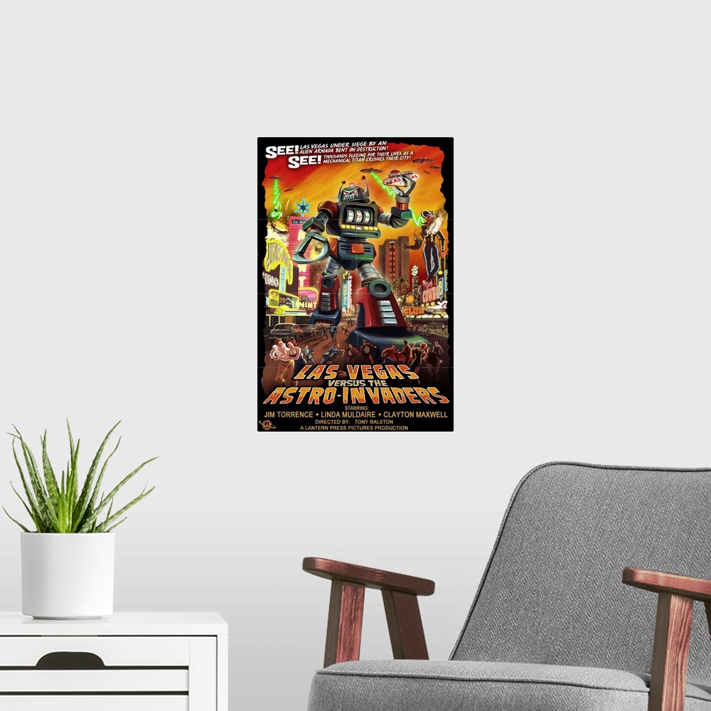 A modern room featuring Retro stylized art poster of robot space invader terrorizing a city.