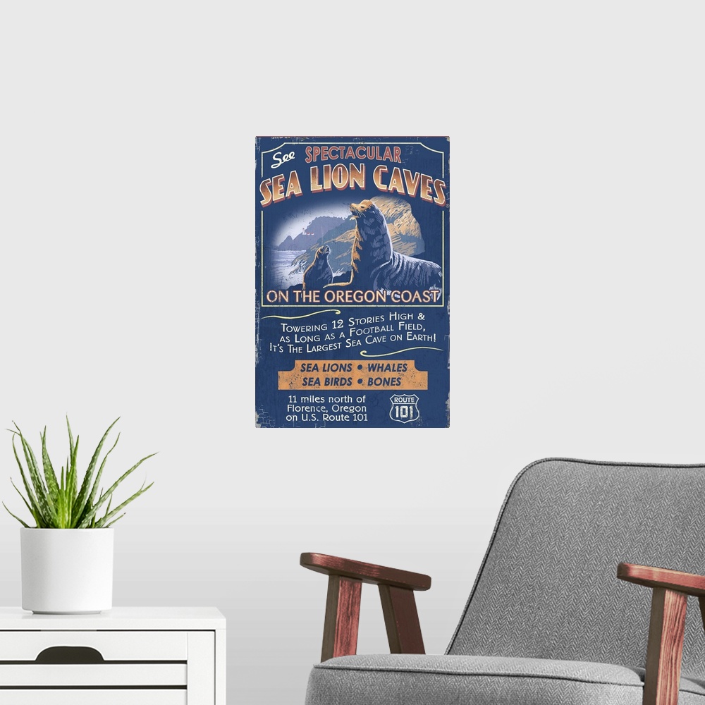 A modern room featuring Retro stylized art poster of a vintage sign of sea lions in a coastal scene.