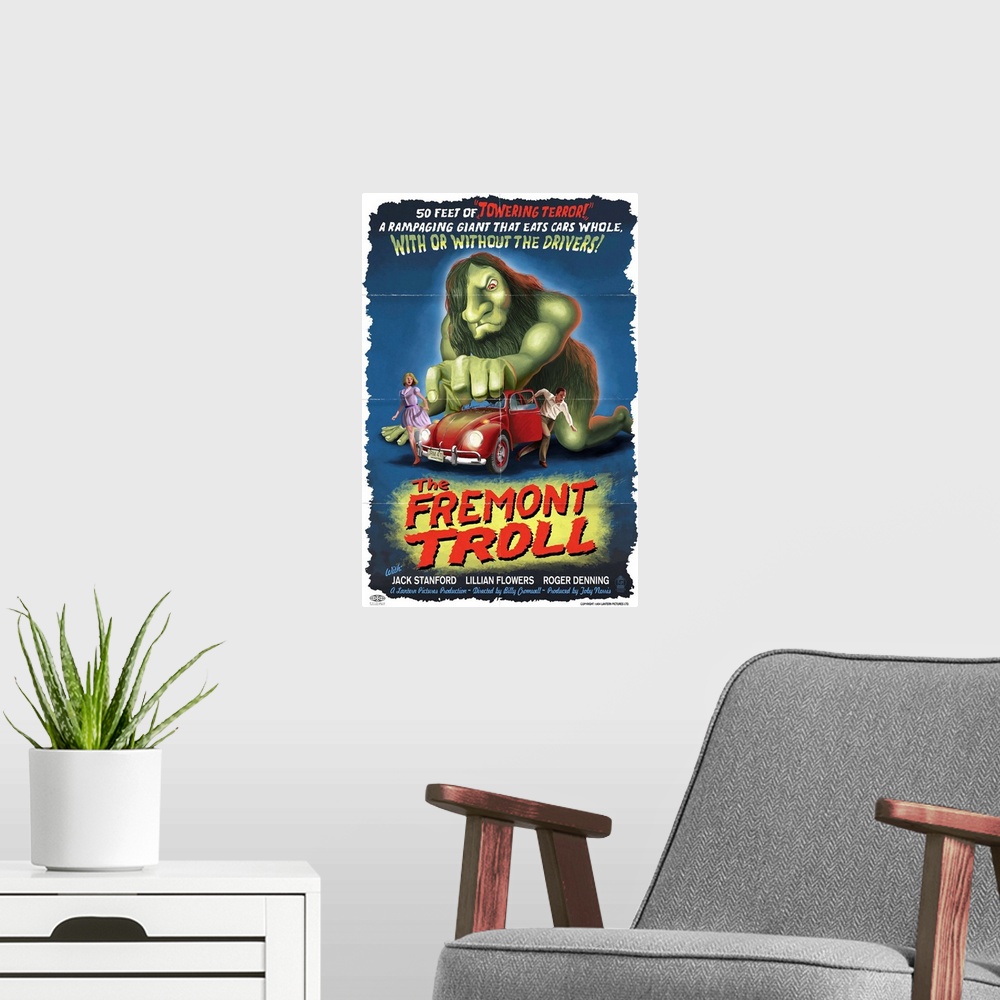 A modern room featuring Retro stylized art poster of vintage movie poster of a troll grabbing a car, and its passengers r...