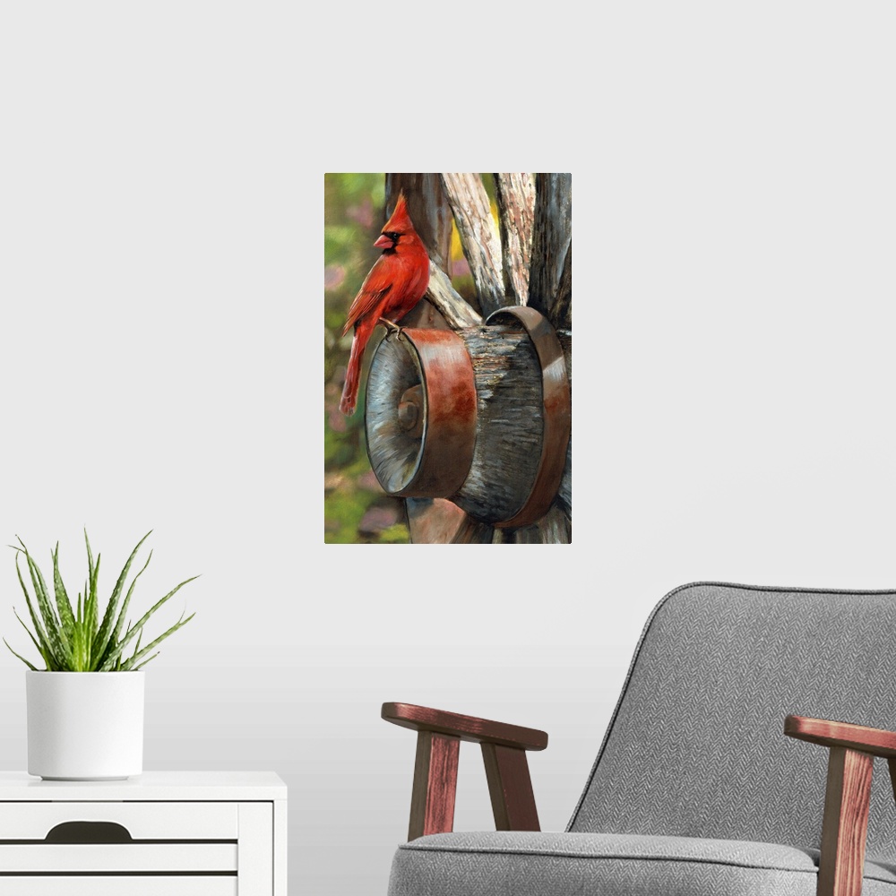 A modern room featuring A bright red cardinal sitting on the edge of a wagon wheel.