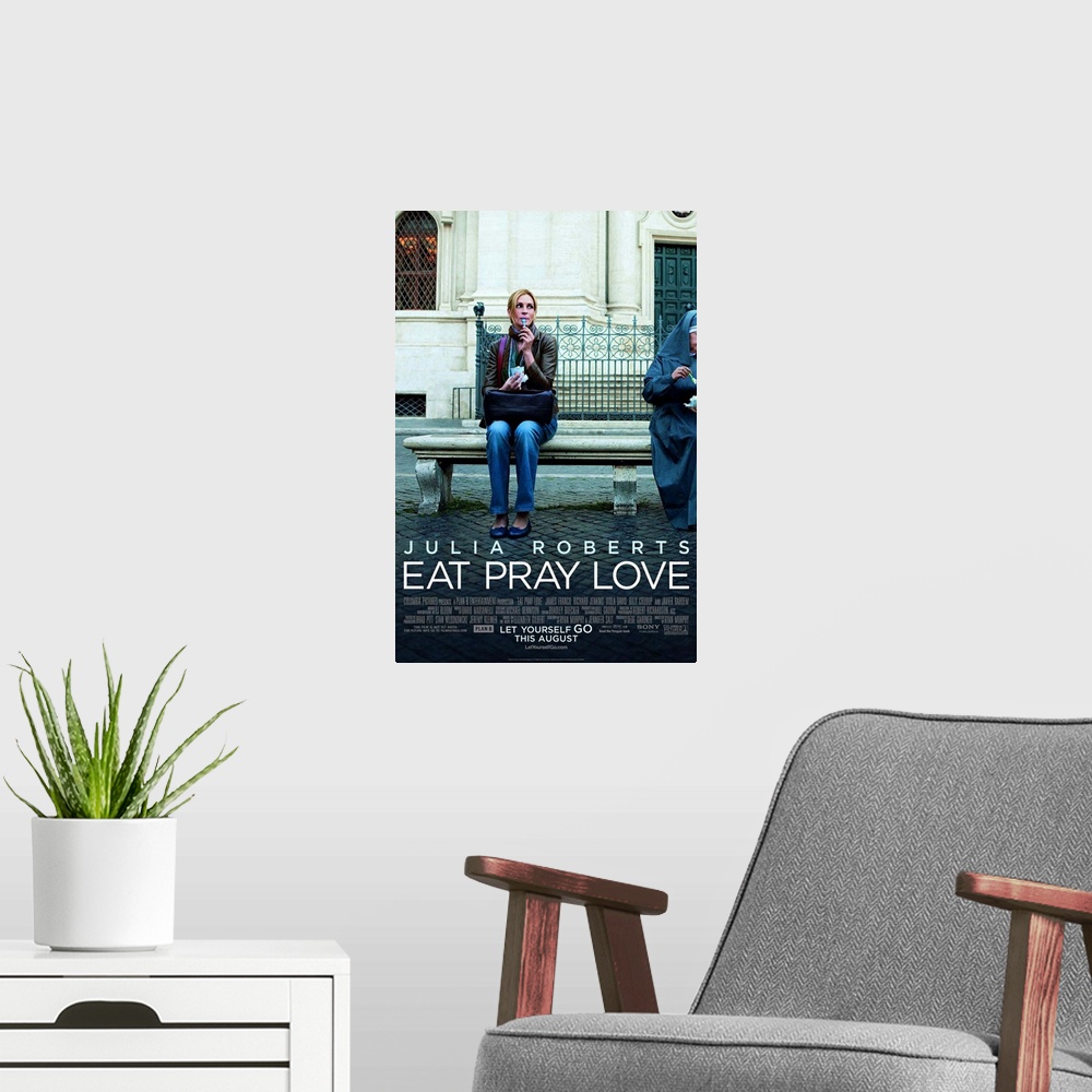 A modern room featuring Eat, Pray, Love - Movie Poster