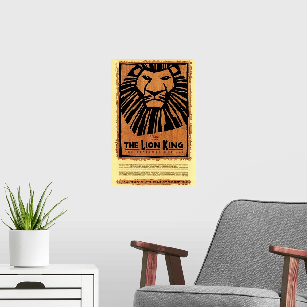 A modern room featuring Large canvas of a poster for The Lion King on Broadway.