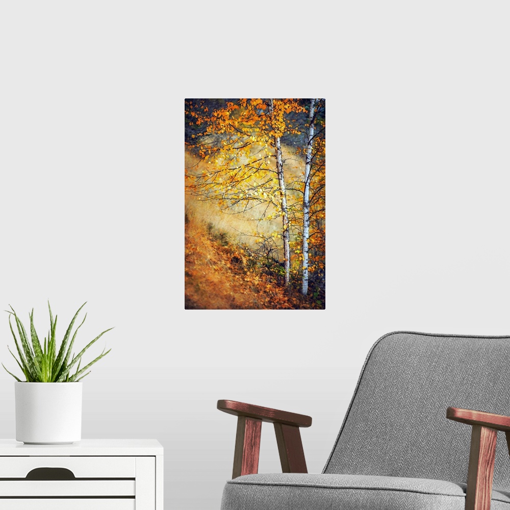 A modern room featuring Two trees with yellow leaves neighbor each other on a sloped hill in this painting.