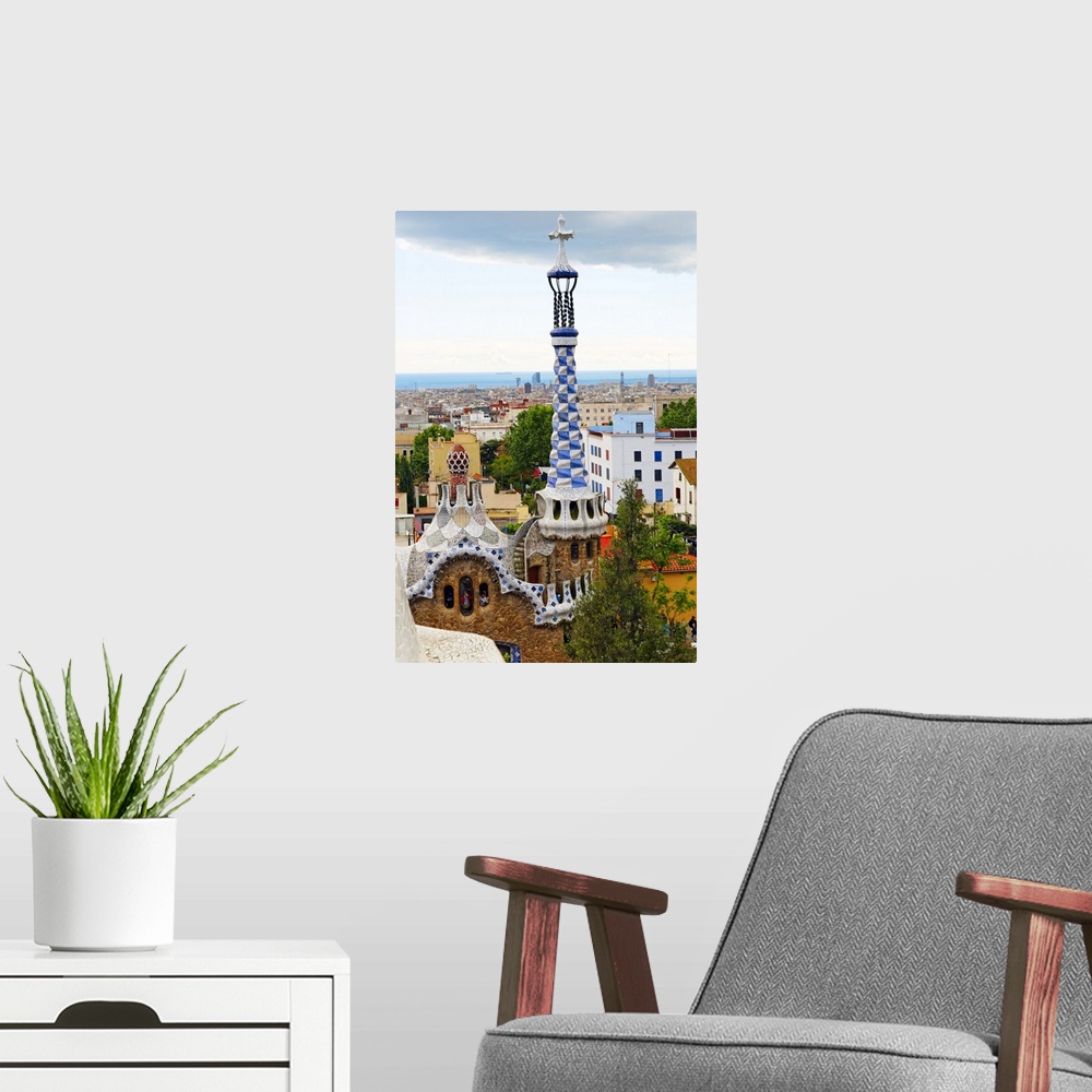 A modern room featuring High Angle View of the Gatehouse with White and Blue Tower, Park Guell