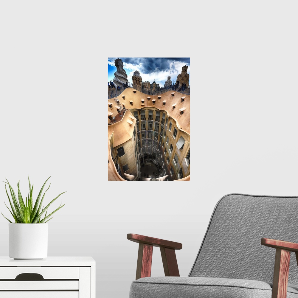 A modern room featuring Rooftop View of Casa Mila (La Pedrera) With Group of Chimneys