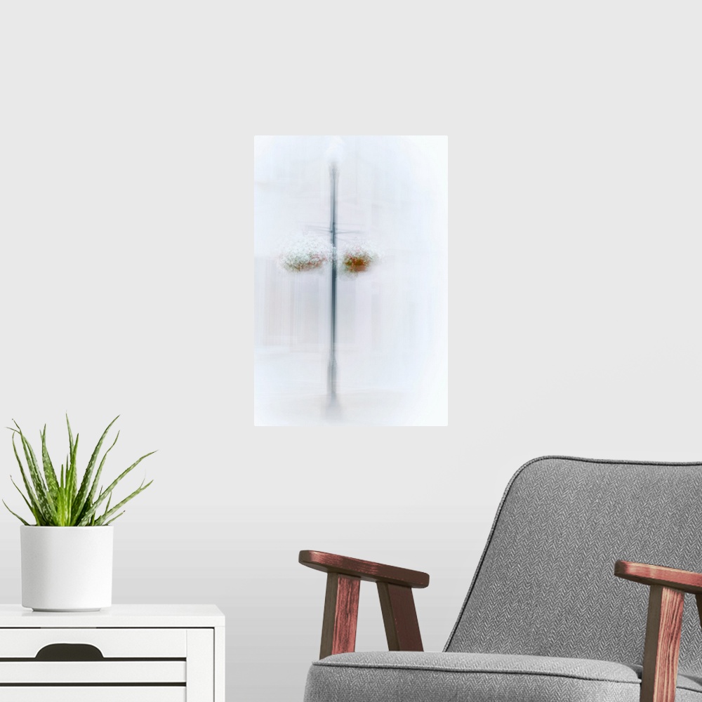 A modern room featuring Conceptual image of two hanging flower baskets on a post, obscured by hazy white light.