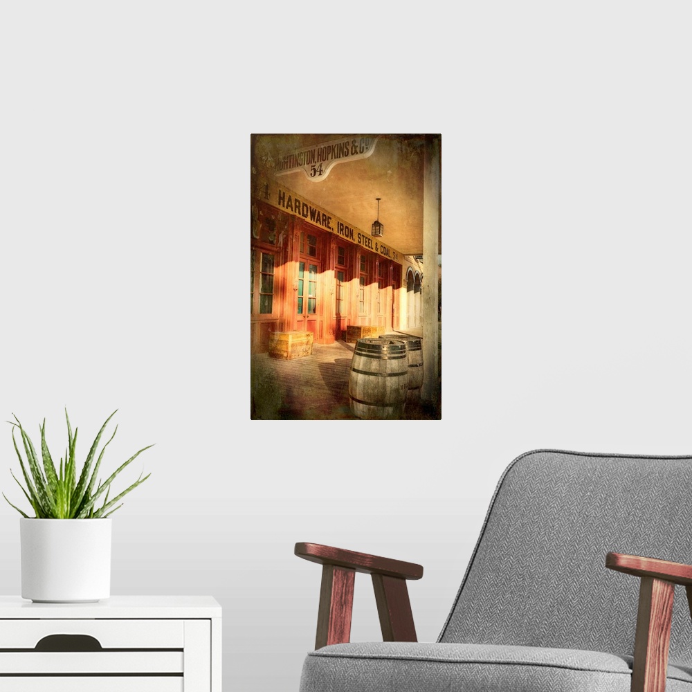 A modern room featuring A photo of a storefront from a frontier town that has been edited to an antique effect.