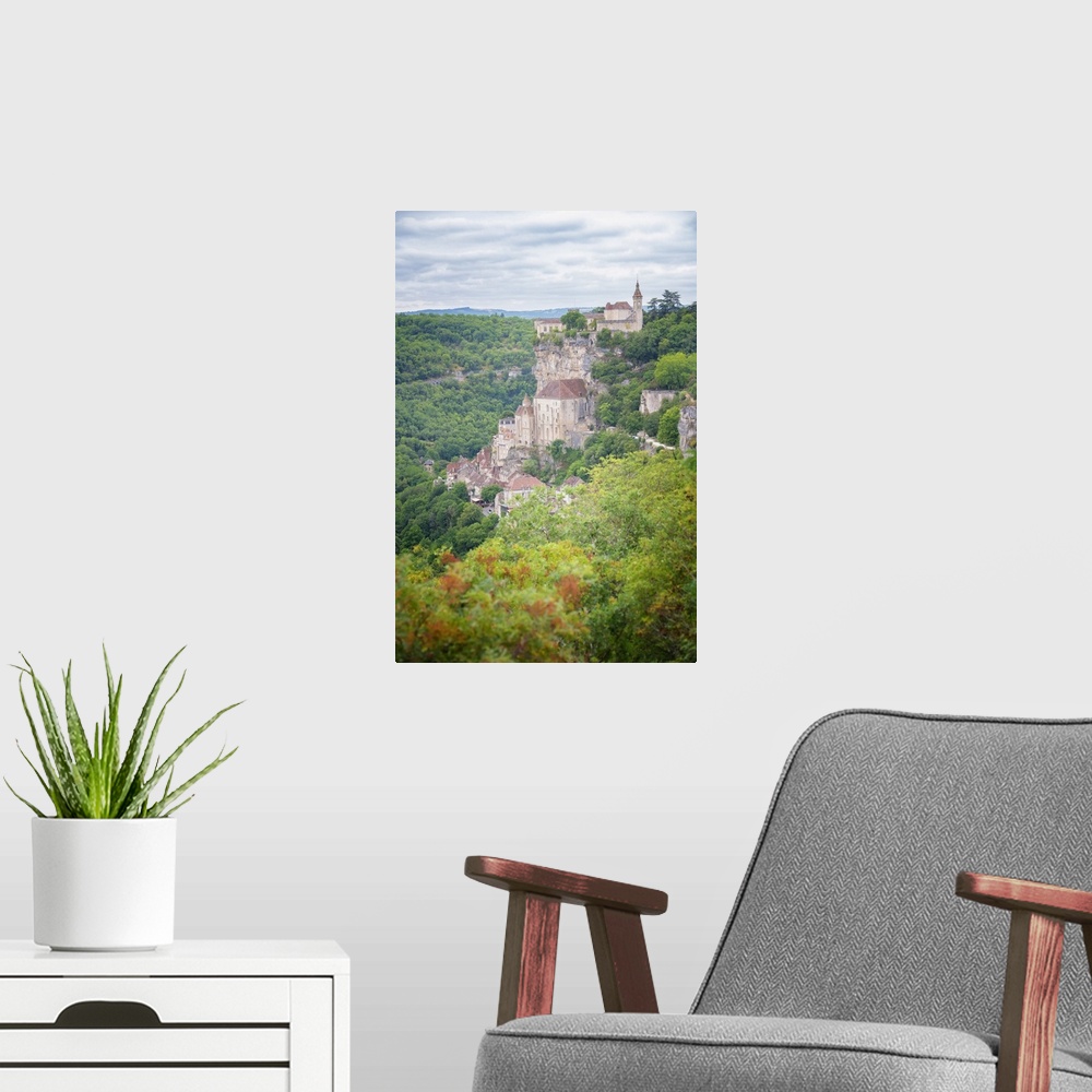 A modern room featuring Verical view of Rocamadour old medieval village in the south of France, occitanue area, among tre...