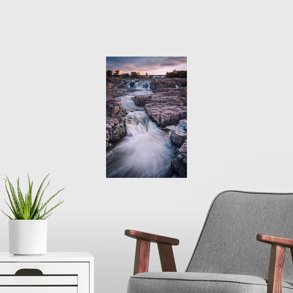 A modern room featuring Cascading waterfall in Sioux Falls South Dakota during sunset.