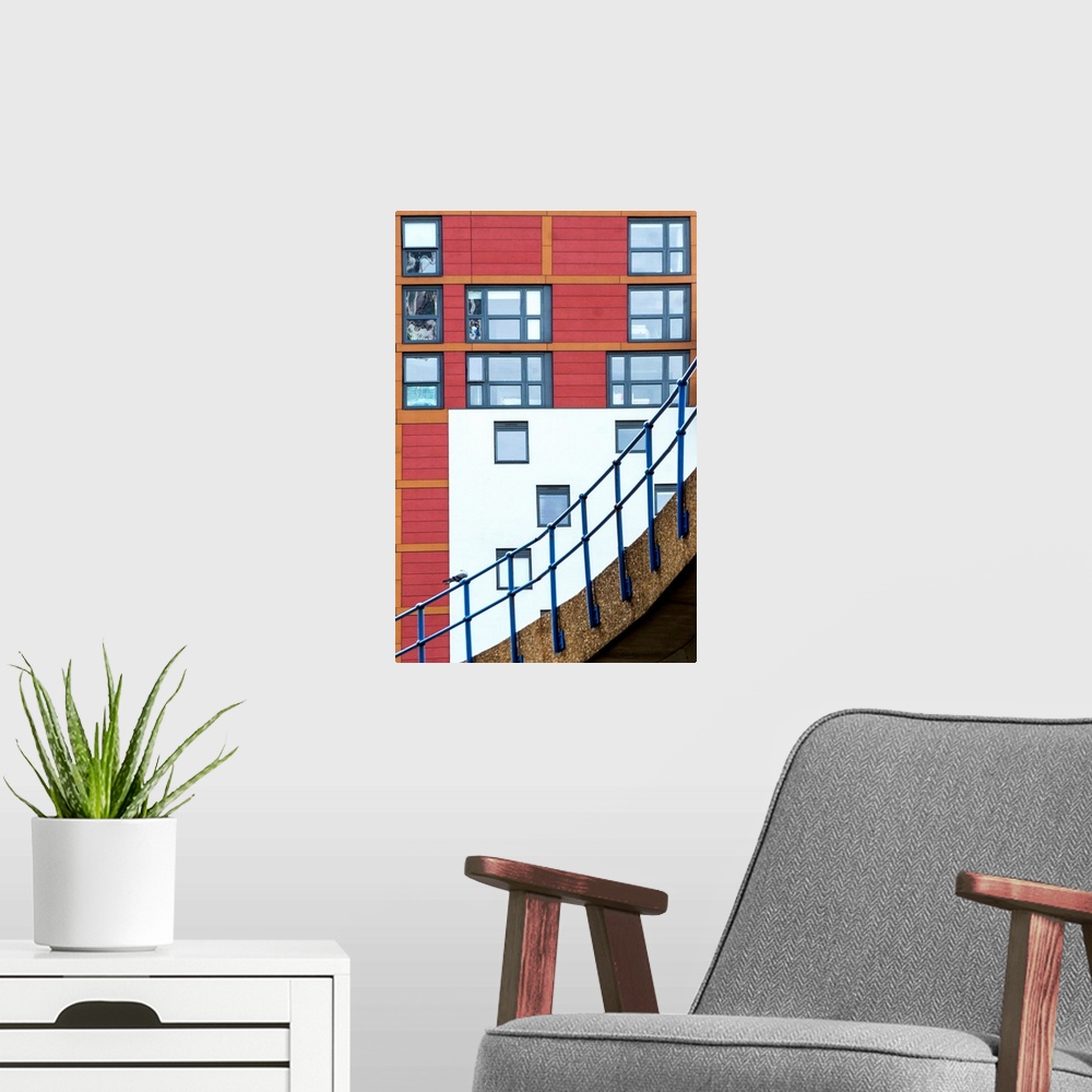 A modern room featuring A photograph of architectural details in a city.