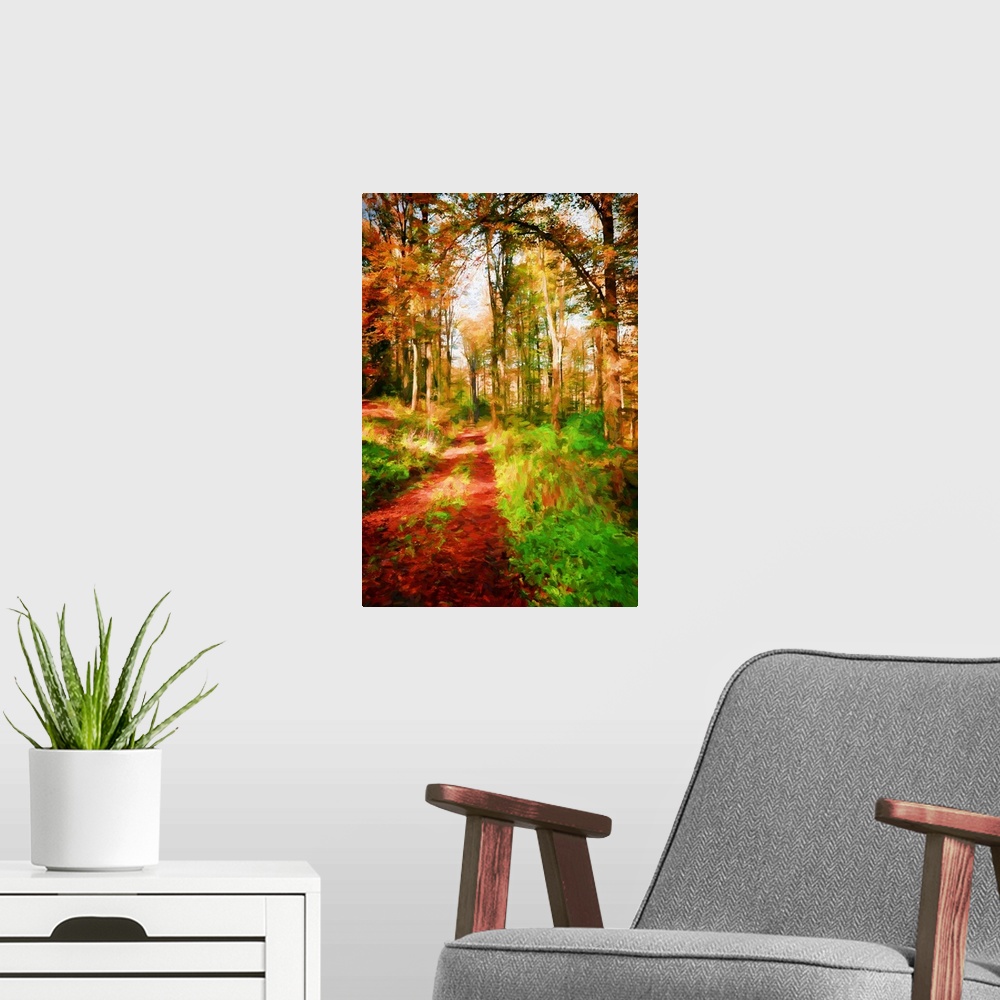 A modern room featuring A photograph of a forest with turning autumn foliage.