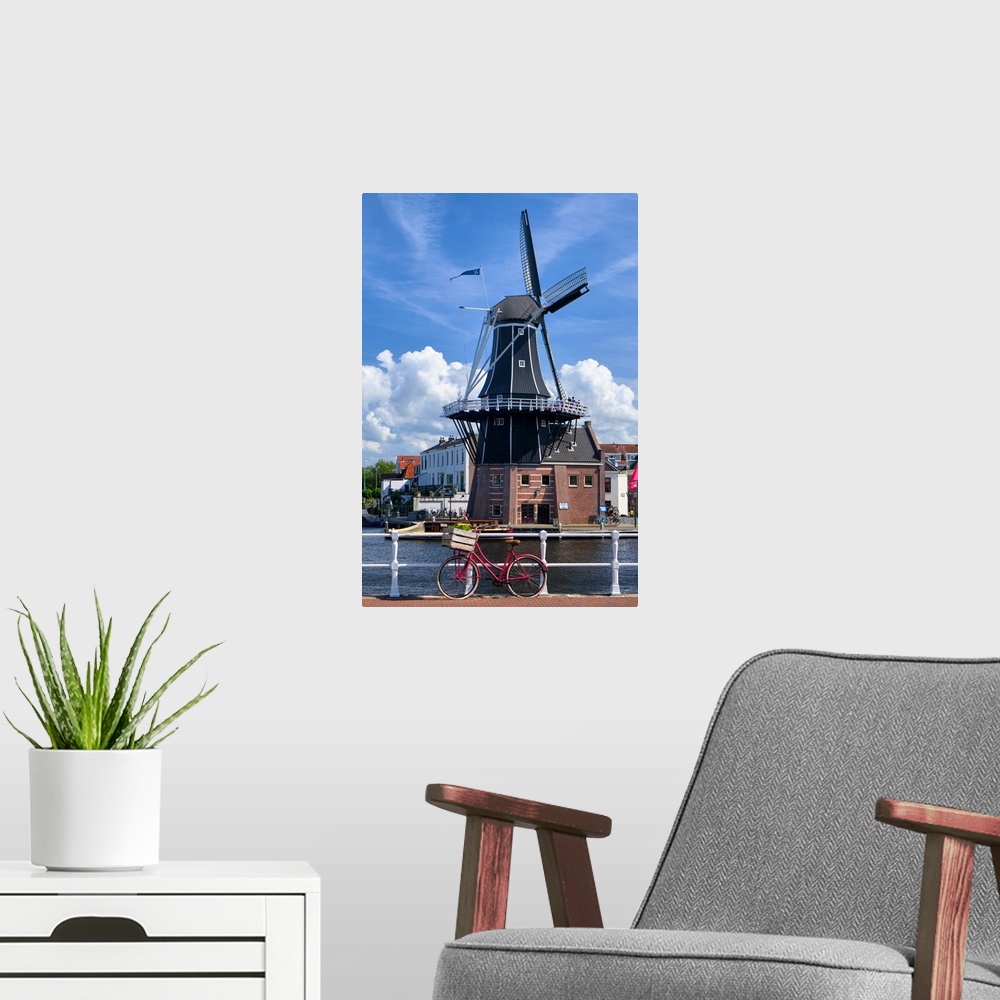 A modern room featuring Bicycle on the Bridge with the De Adriaan Wndmill in the Background, Haarlem; The Netherlands