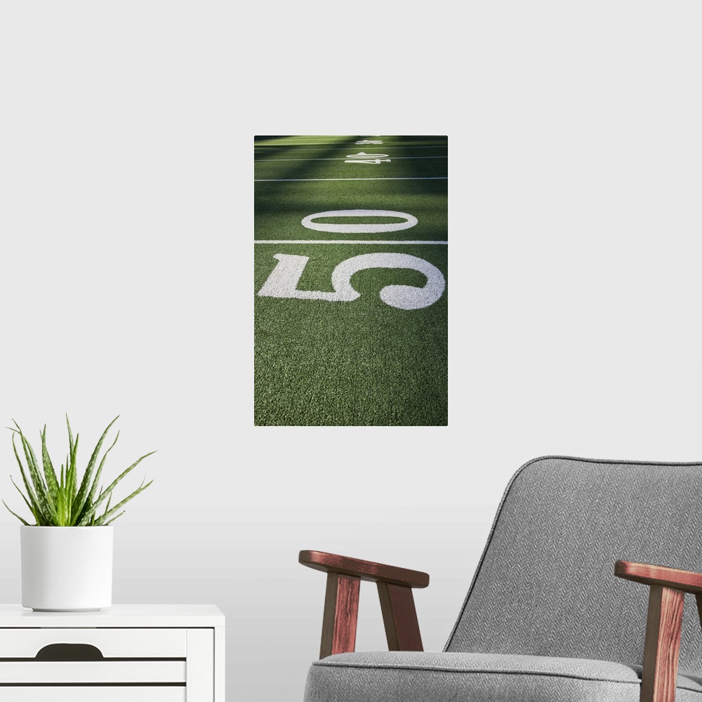 A modern room featuring 50 yard line marker in American Football stadium