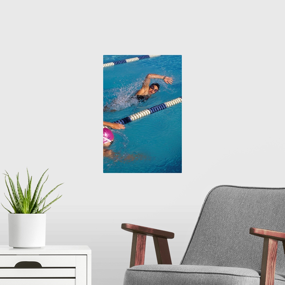 A modern room featuring Female swimmer in action