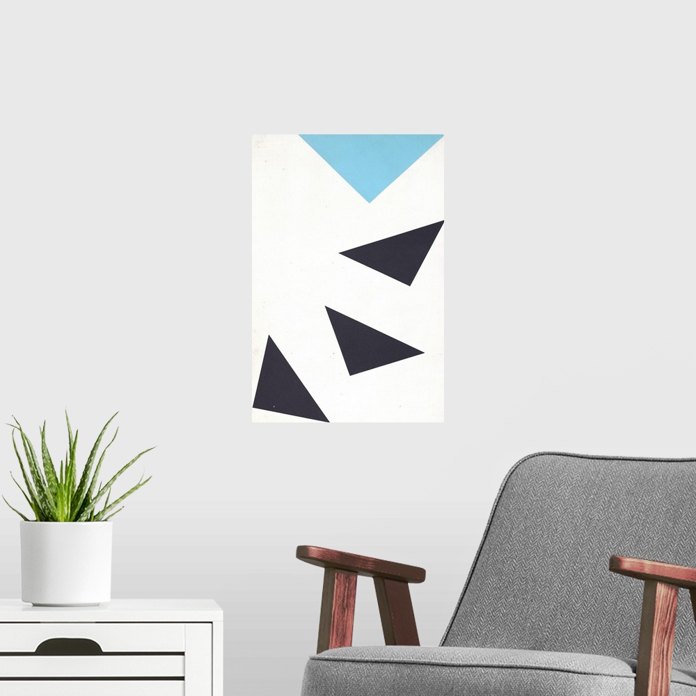 A modern room featuring Geometric abstract painting of blue and black triangles pointing down, following each other in a ...