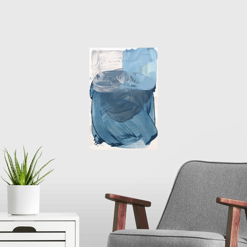 A modern room featuring Blue abstract artwork in a series of three primary color paintings.