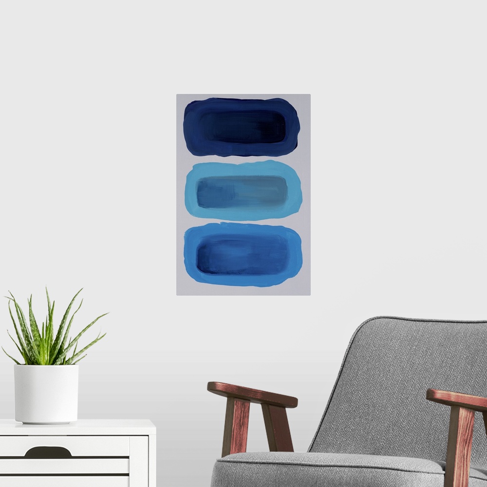 A modern room featuring Contemporary abstract painting with a gray background and three rounds shapes stacked vertically ...