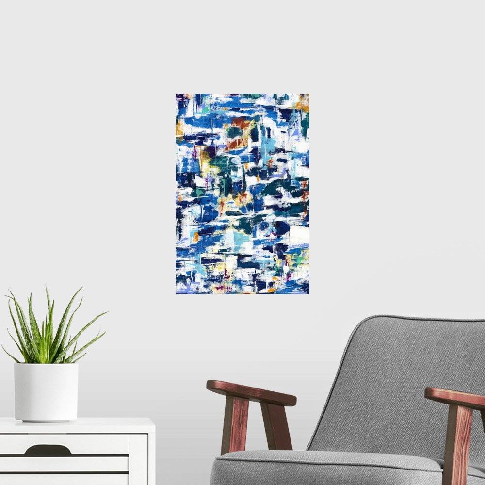 A modern room featuring Large abstract artwork with busy brushstrokes in shades of blue, yellow, orange, green, and red.