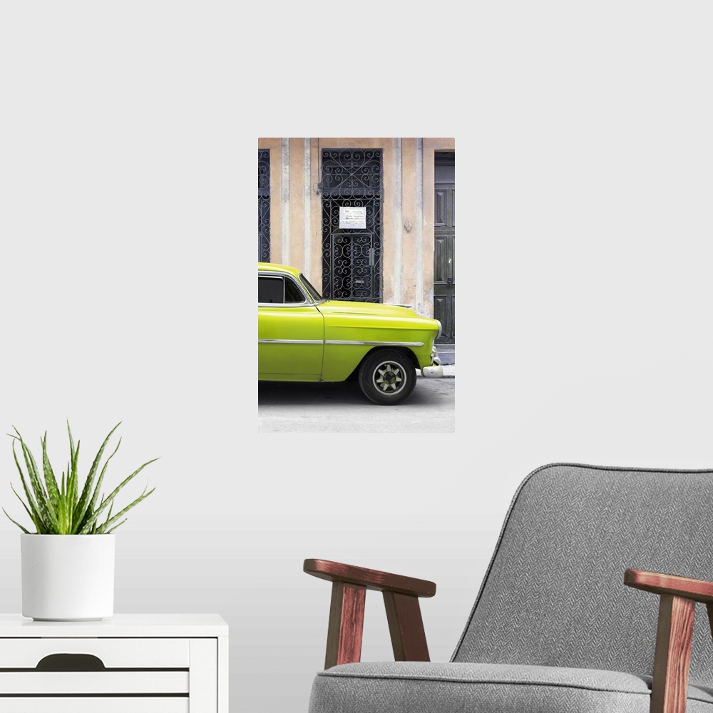 A modern room featuring Photograph of a lime green vintage car parked outside in the streets of Havana.