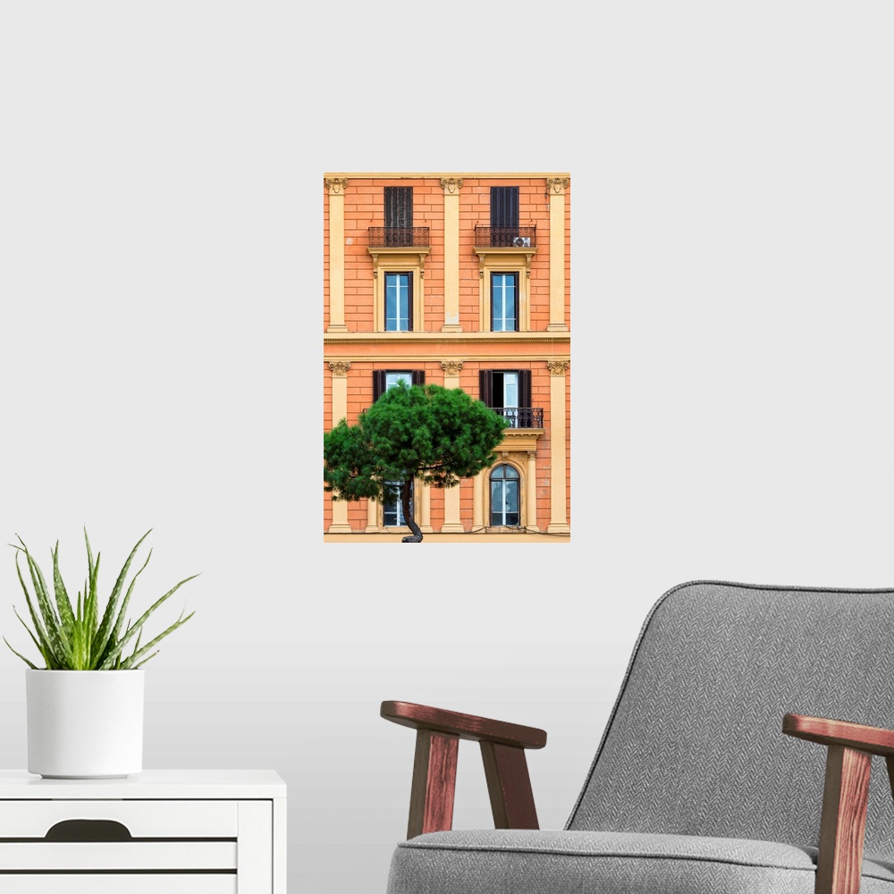 A modern room featuring It's a orange facade of a building in the city of Rome in Italy.