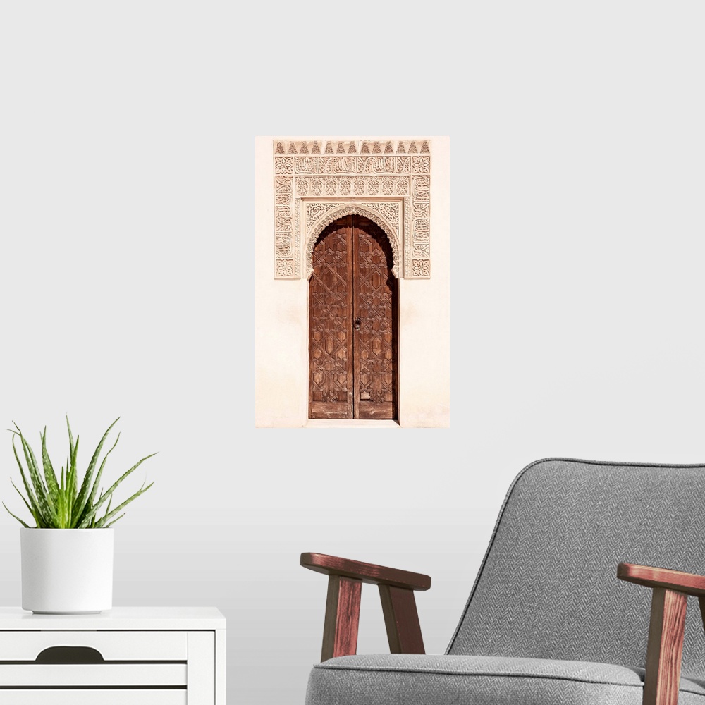 A modern room featuring It's a wooden door with arabic designed arch in the Alhambra, Granada, Spain.