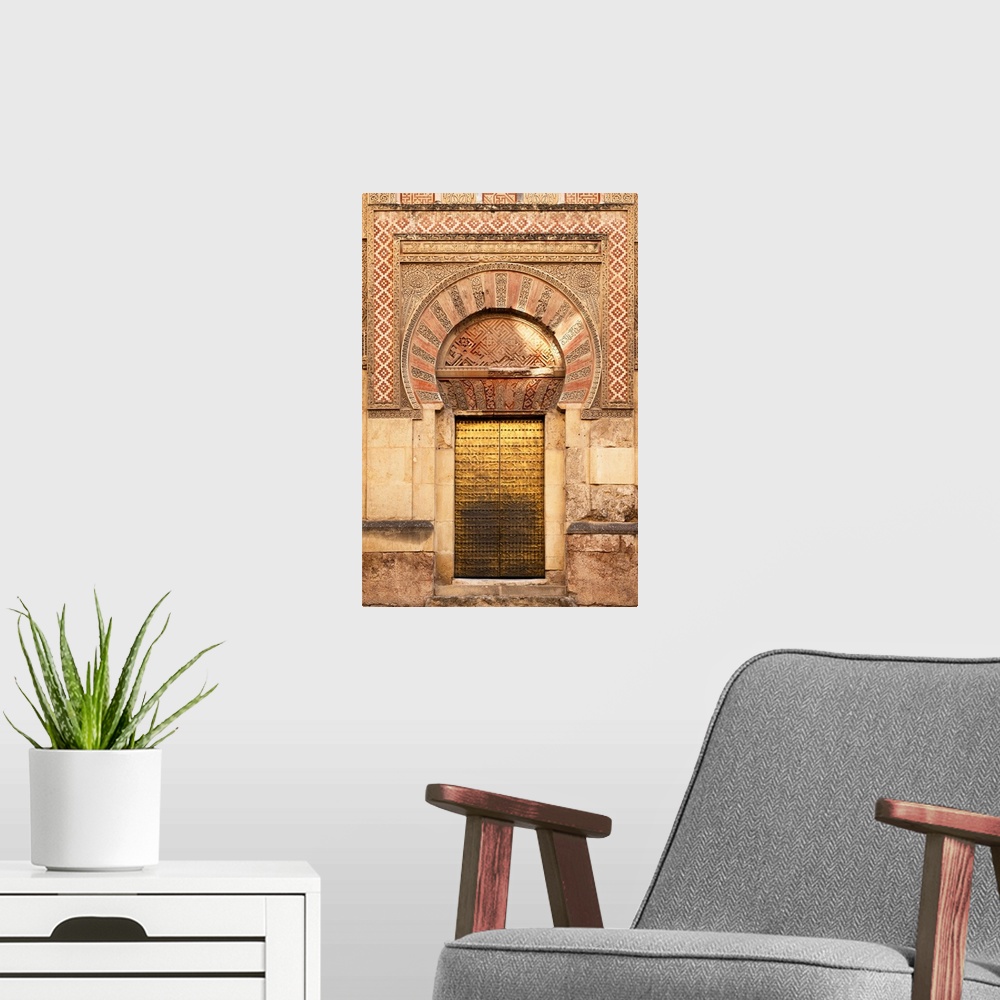 A modern room featuring It's a golden door of the famous Mosque-Cathedral of Cordoba in Spain.