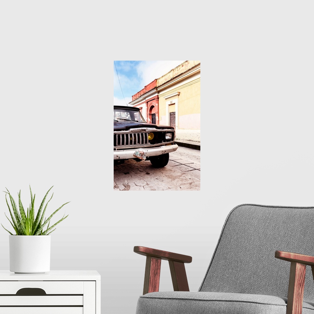 A modern room featuring Photograph of a colorful Mexican street with an old black Jeep on the road. From the Viva Mexico ...