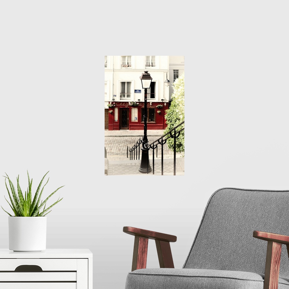 A modern room featuring A photograph of a lamppost in Paris.