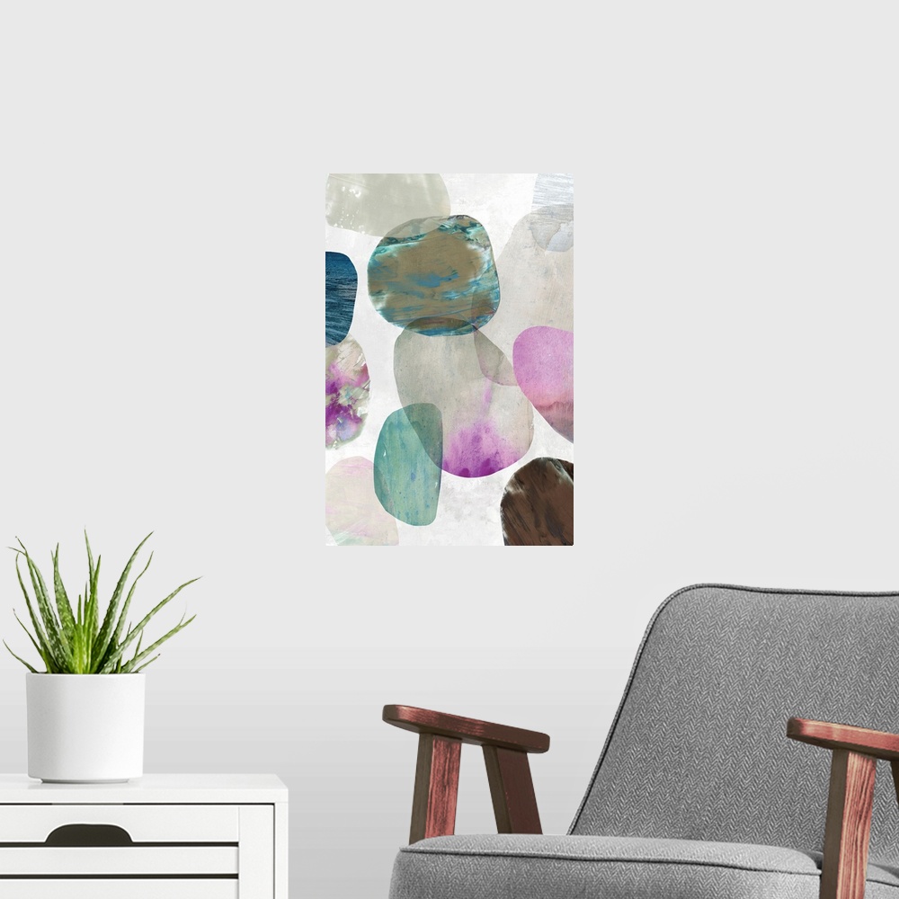A modern room featuring Contemporary painting of multi-color circles in tones of pink, brown and blue in the appearance o...