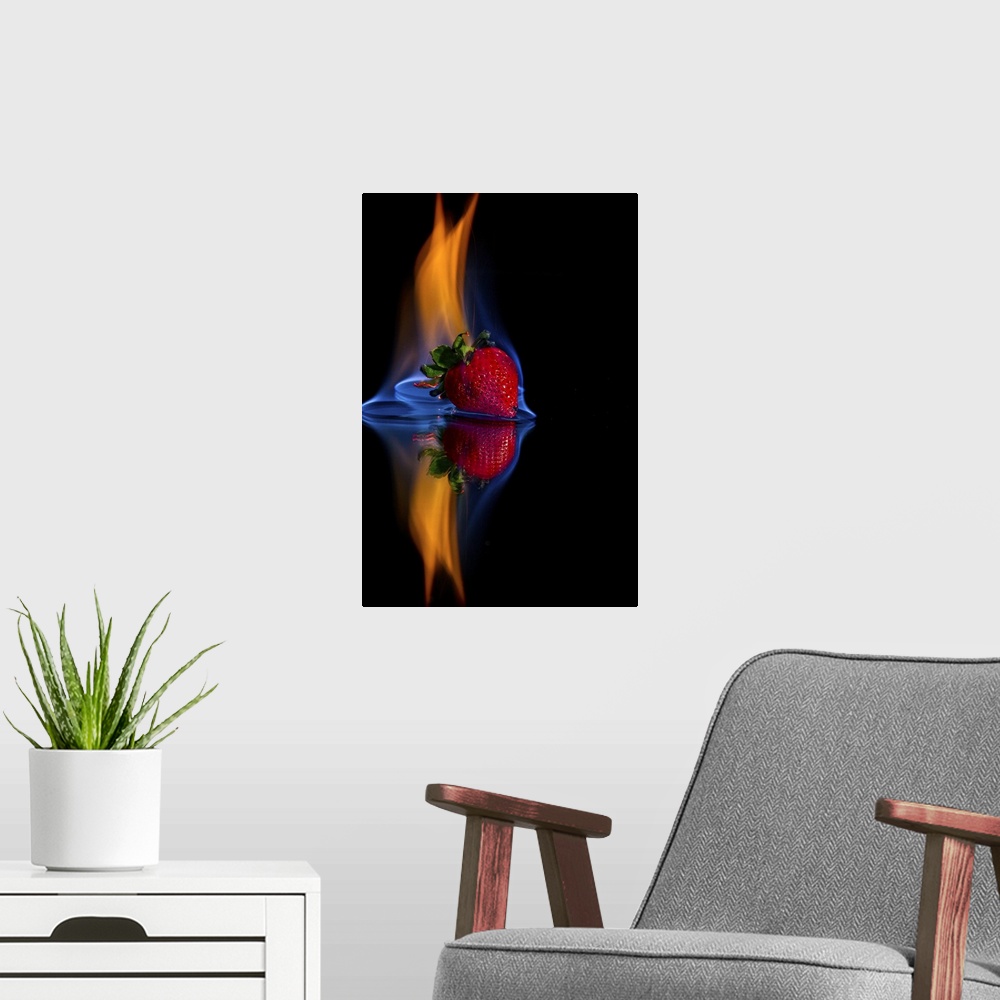 A modern room featuring Burning strawberry on a mirror with a black background.
