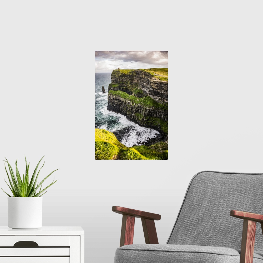 A modern room featuring Photograph of O'Brien's Tower, marking the highest point of the Cliffs of Moher in Ireland.