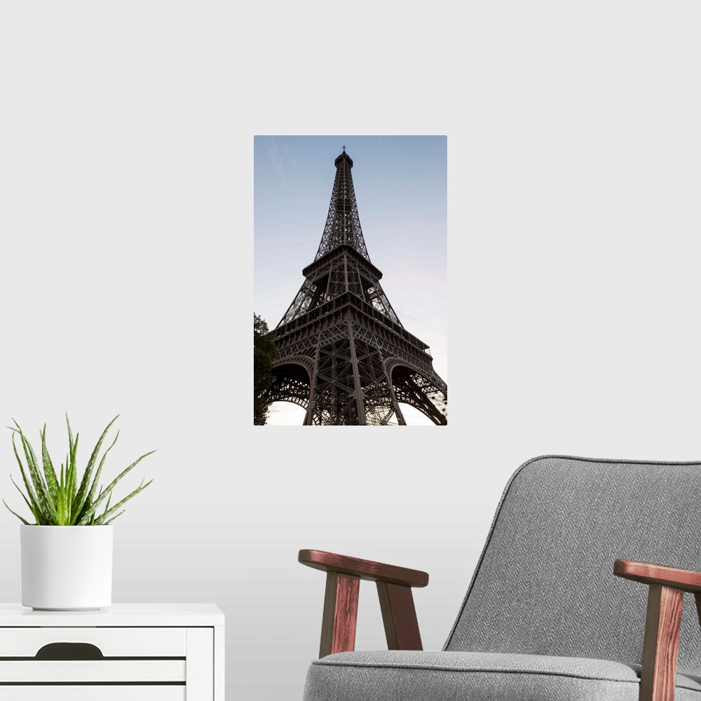 A modern room featuring Photograph looking up at the Eiffel Tower, Paris