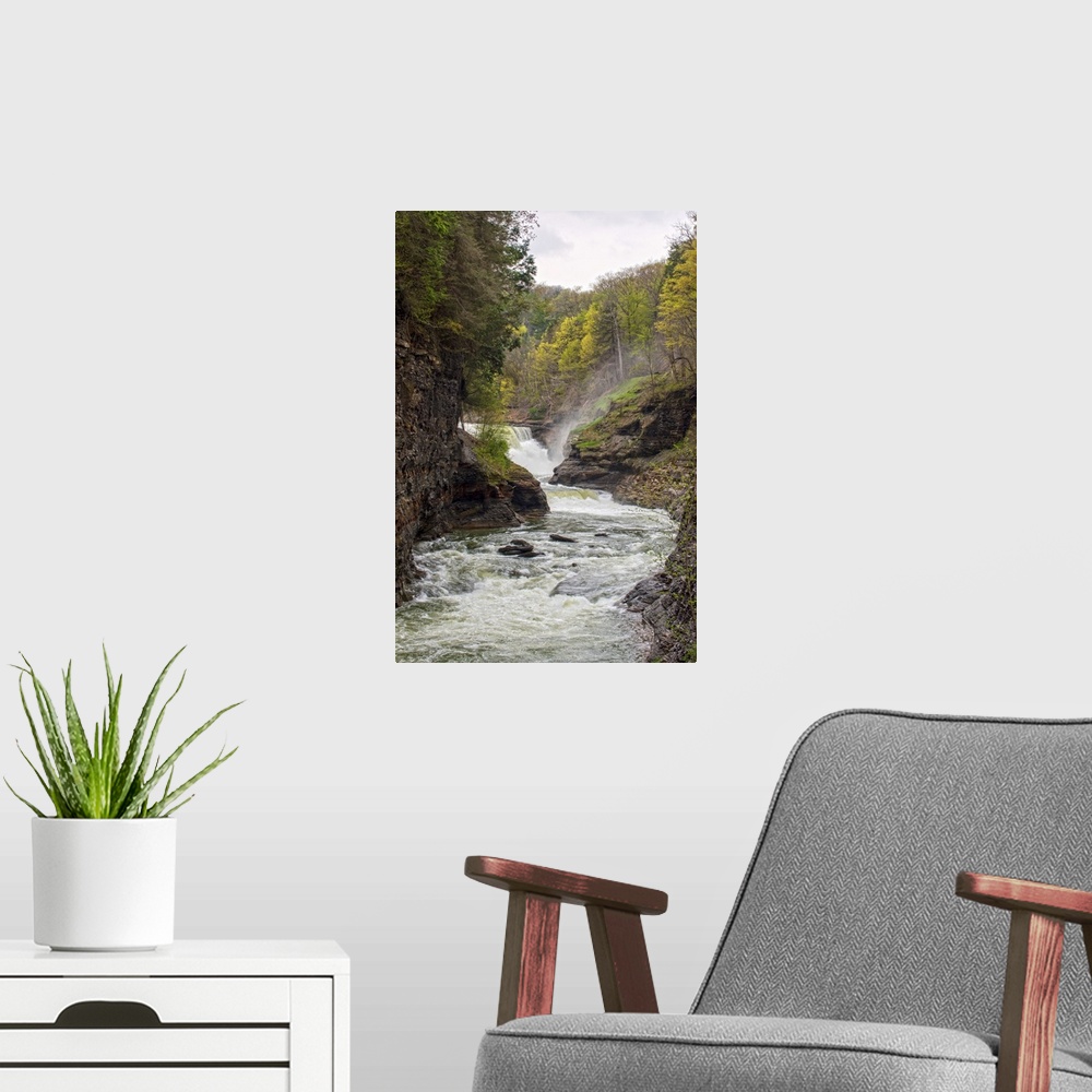 A modern room featuring Landscape photograph of the Genesee River rushing through Letchworth State Park with a waterfall ...